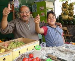 Happy greengrocers in Port Suez